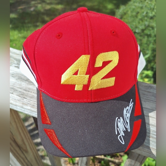 Red and Black Cap with Yellow 42 Juan Pablo Montoya Winners Circle. Minor Stain. - Picture 1 of 11